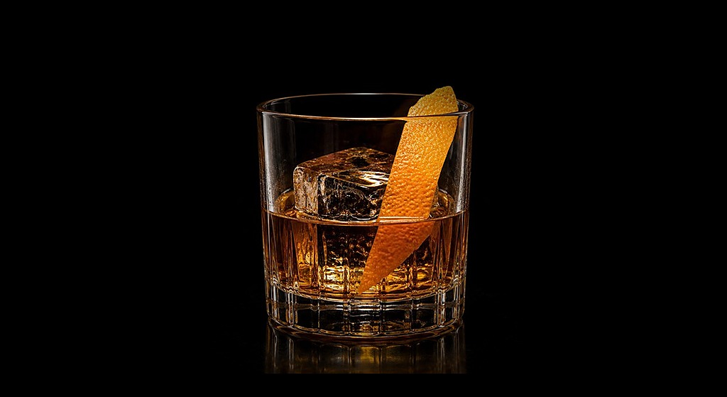 old fashioned cocktail in a serving glass