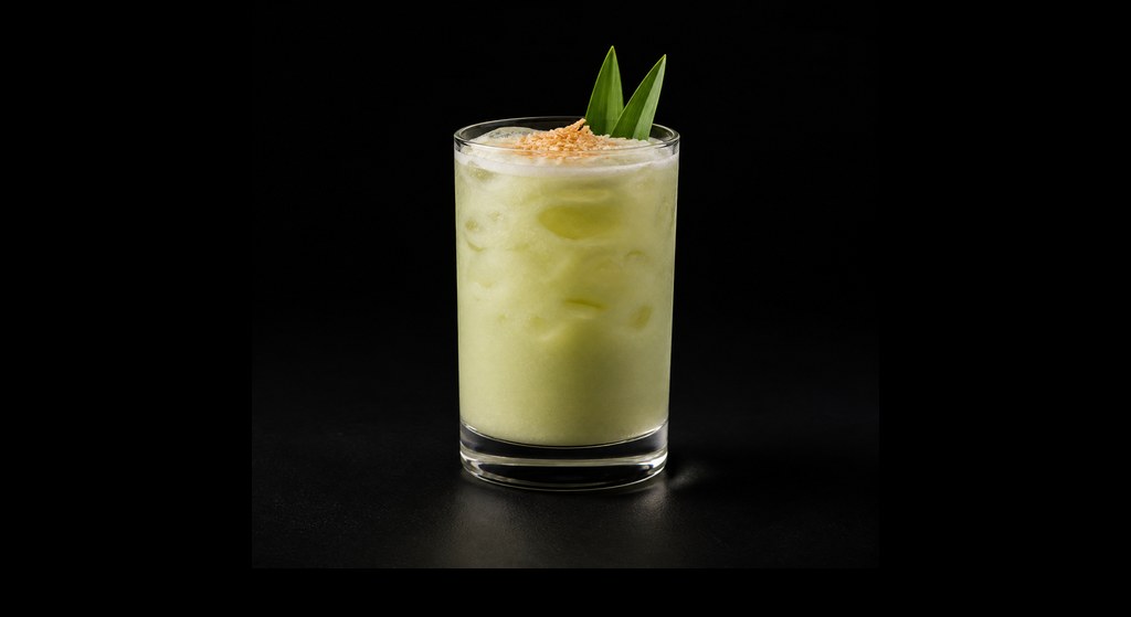 Pandan Paradise cocktail on a dark studio background
