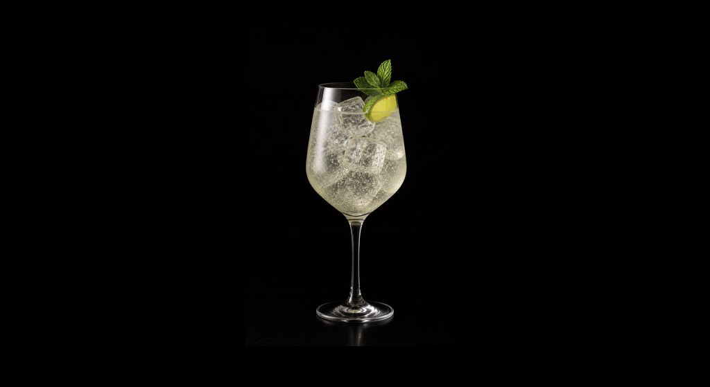 Pickled Hugo cocktail on a dark studio background