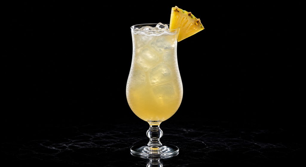 Pineapple Coconut Cooler alcohol-free cocktail on a black background