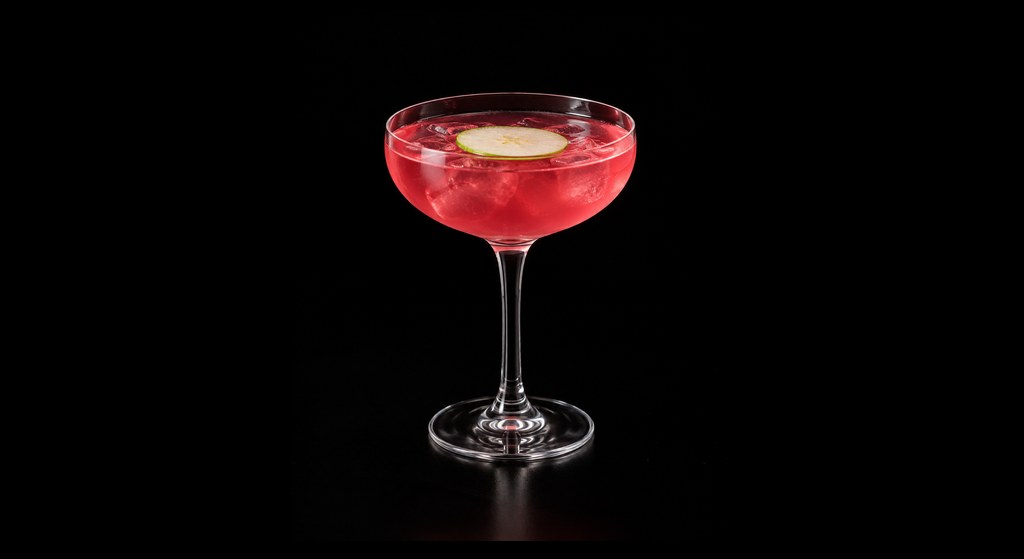 Pink Flamingo cocktail on a dark studio background