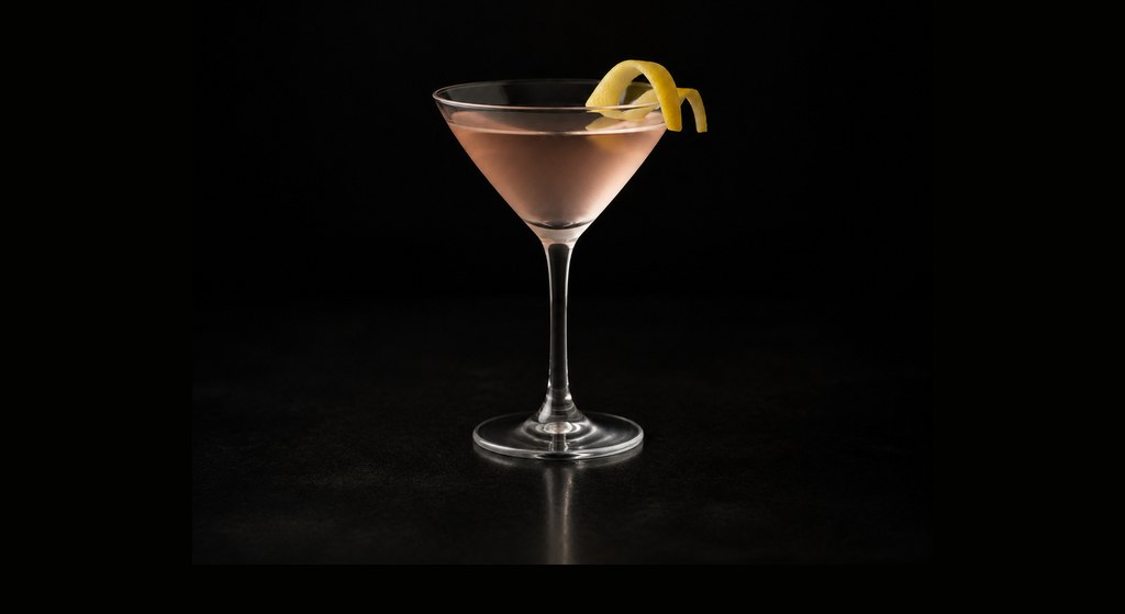 Pink Gin cocktail on a dark studio background