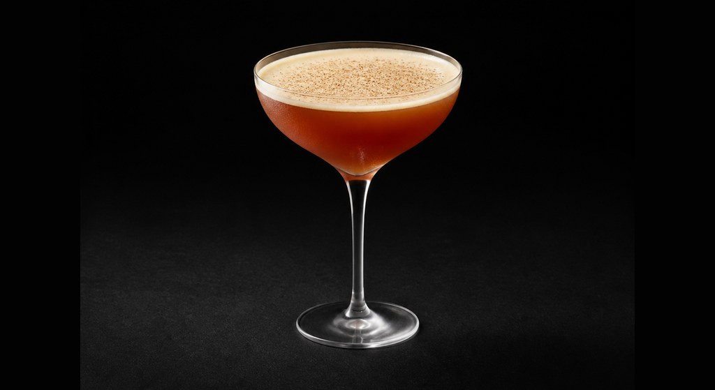 Porto Flip cocktail on a dark studio background