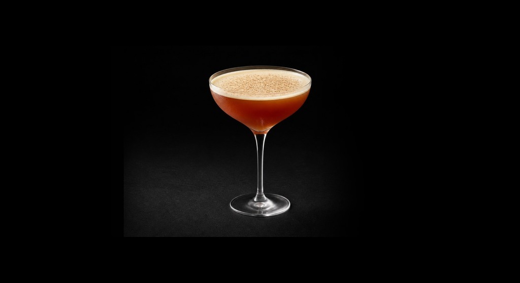 Porto Flip cocktail on a dark studio background