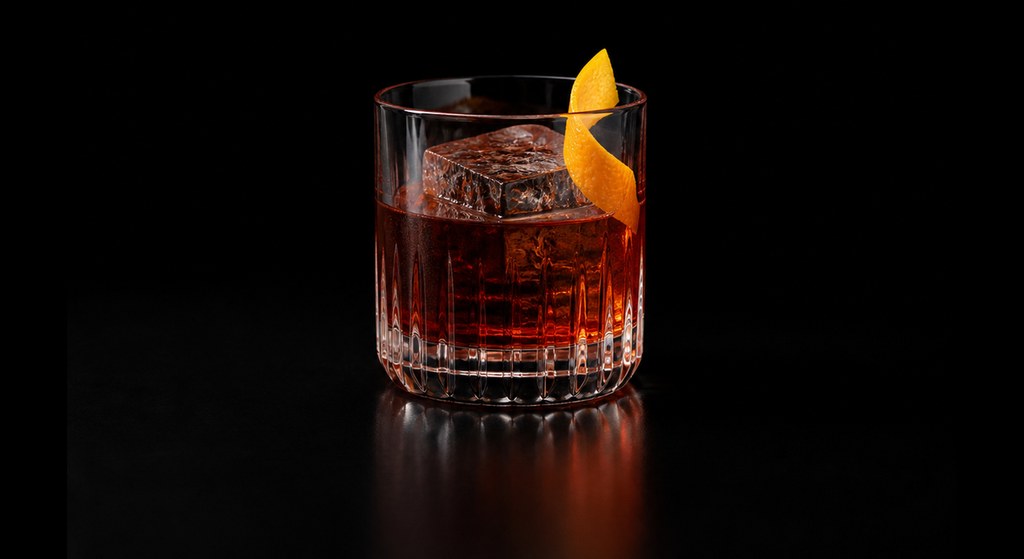 Rabo de Galo cocktail on a dark studio background