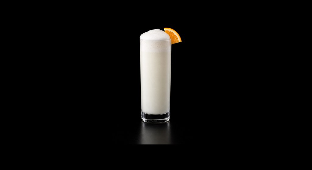 Ramos Gin Fizz cocktail on a dark studio background