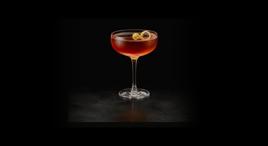 Remember the Maine cocktail on a dark studio background