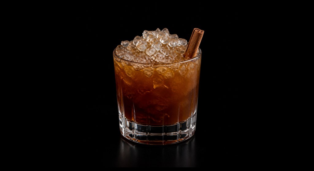 Roman Holiday cocktail on a dark studio background