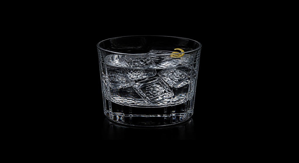 Rum Martini cocktail on a dark studio background