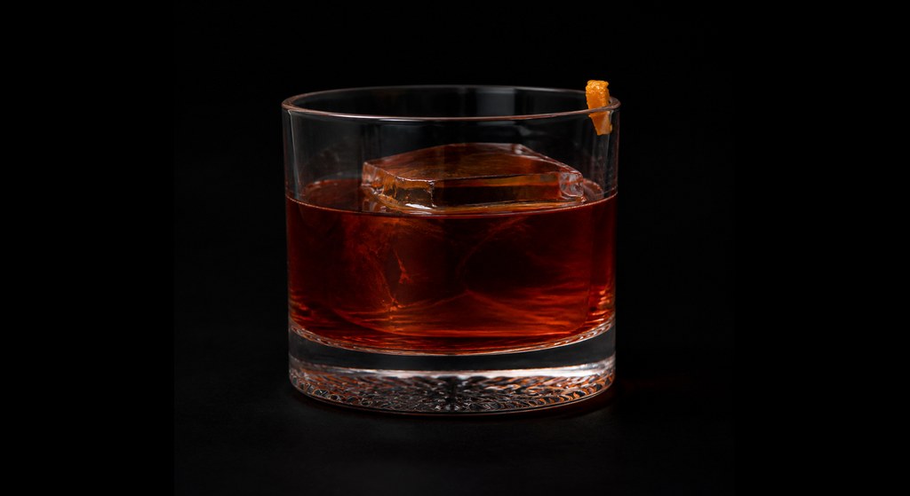 Rye Boulevardier cocktail on a dark studio background