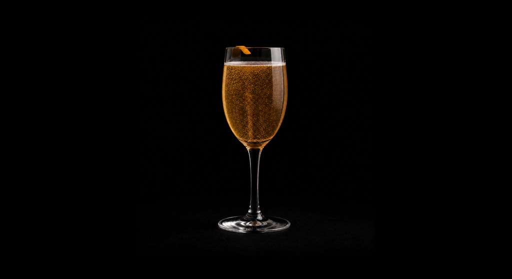 Seelbach cocktail on a dark studio background
