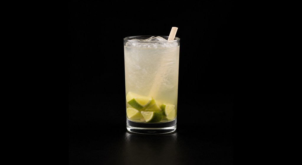 Sherry Caipirinha cocktail on a dark studio background