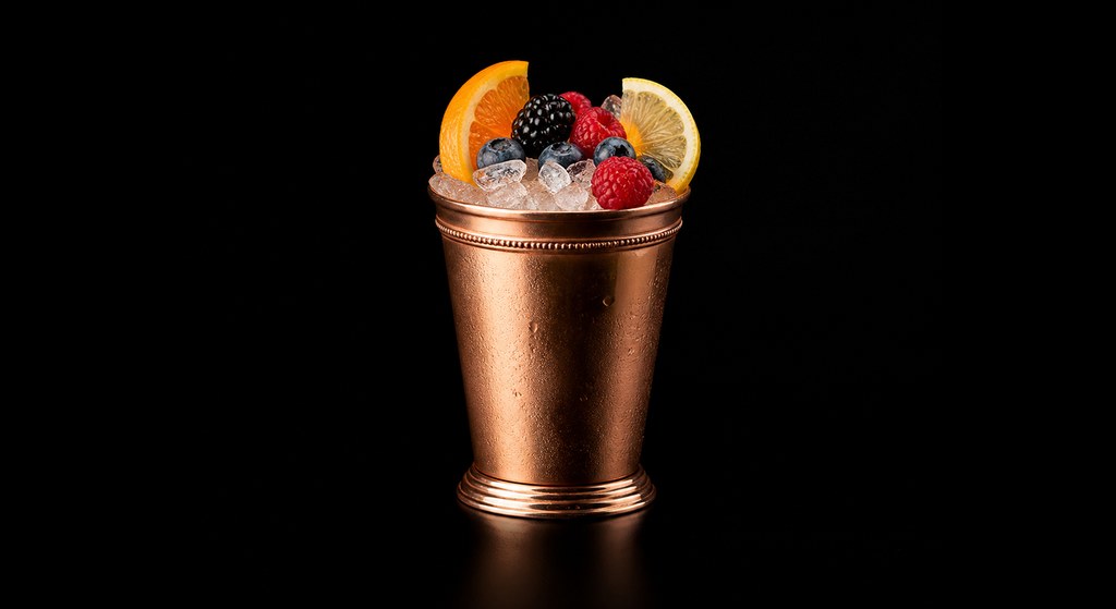 Sherry Cobbler cocktail on a dark studio background