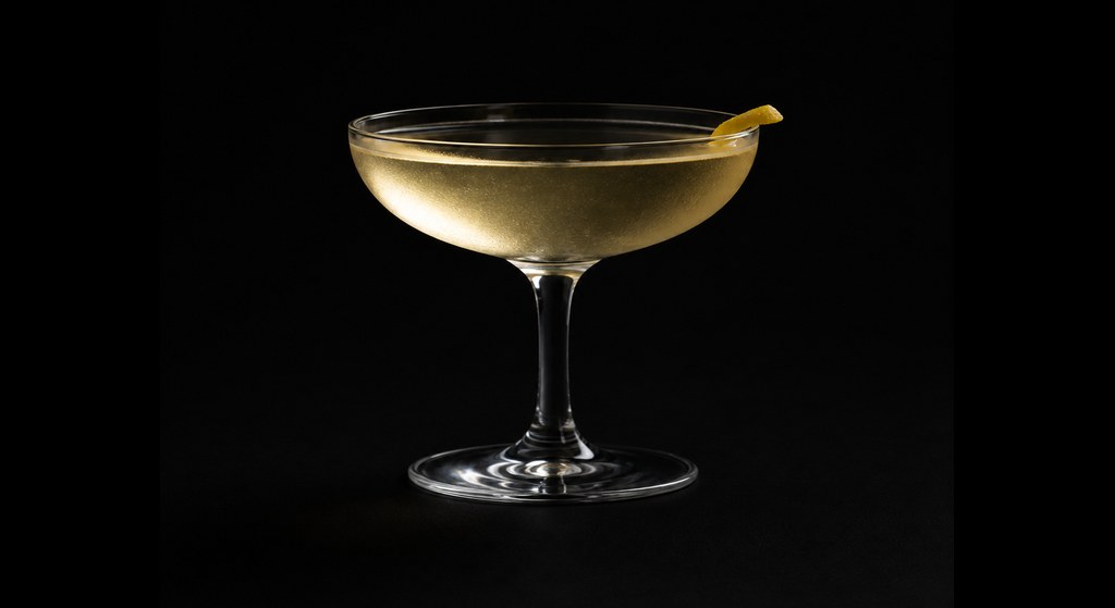 Sherry White Negroni cocktail on a dark studio background