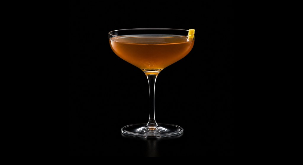 Silvio's Consoler cocktail on a dark studio background