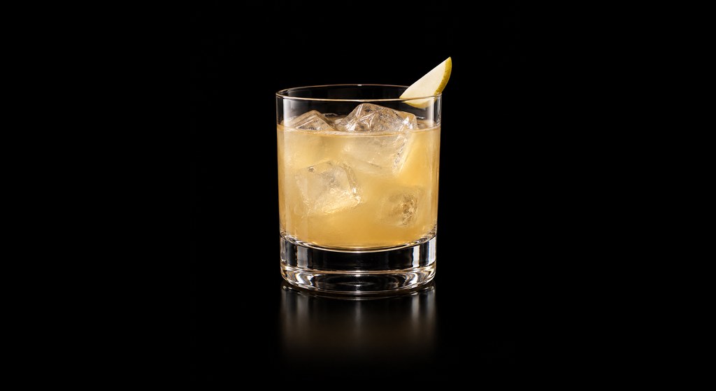 Spiced Pear cocktail on a dark studio background