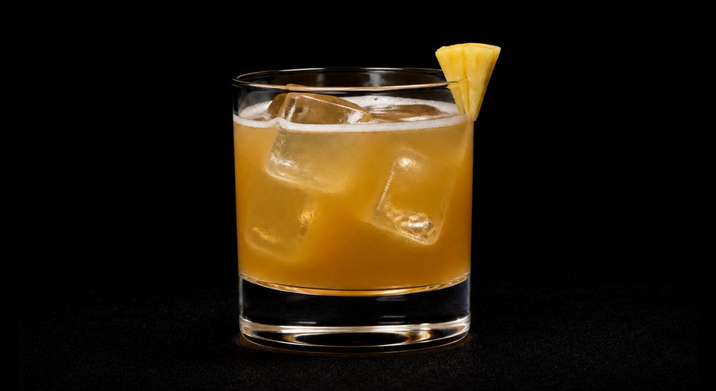 Stormy Colada cocktail on a dark studio background