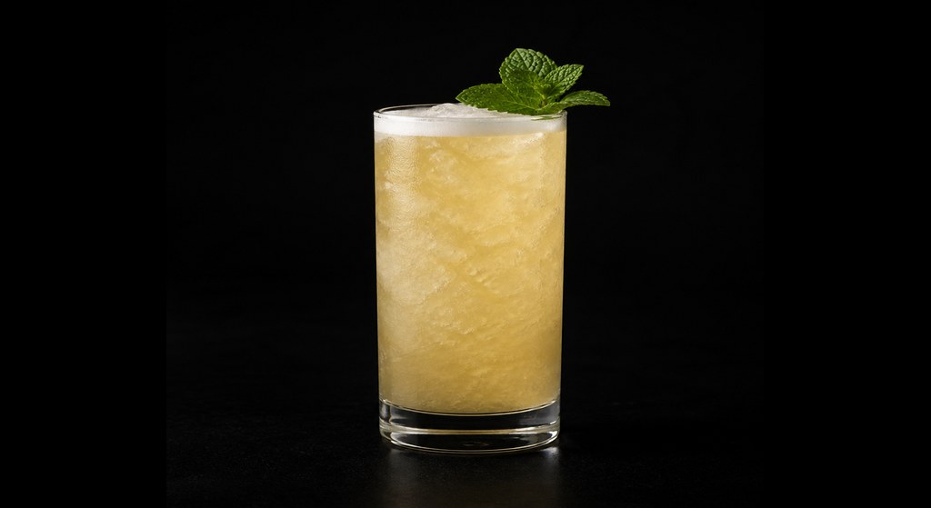 Strange Brew cocktail on a dark studio background
