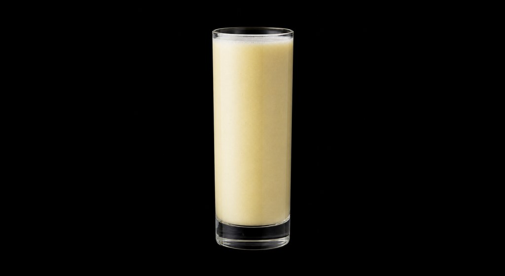 Sweet Bananas cocktail on a dark studio background