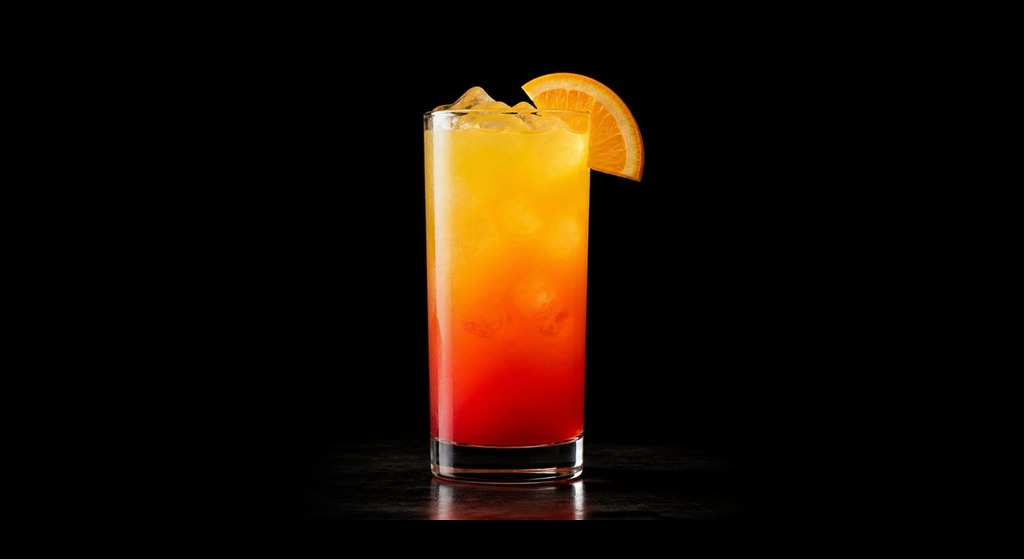 Tequila Sunrise cocktail on a black studio background