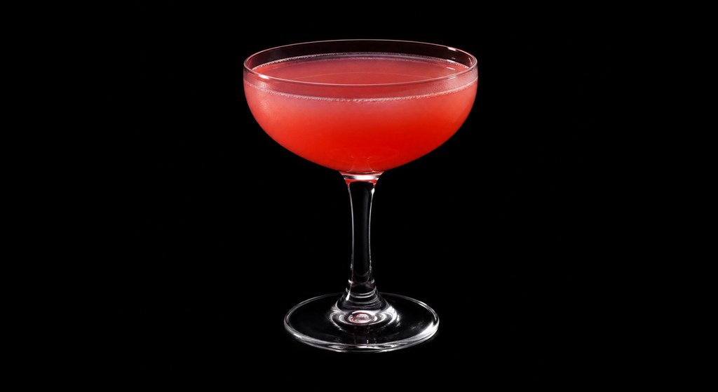 The Blood Orange cocktail on a dark studio background