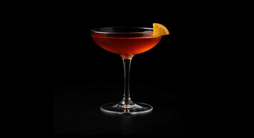 The Frank cocktail on a dark studio background