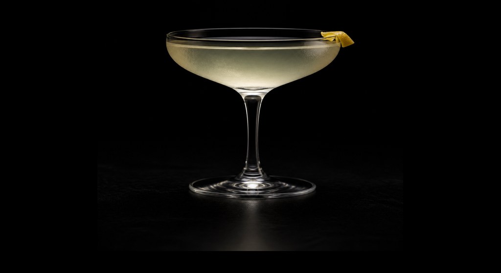 The Joy Division cocktail on a dark studio background