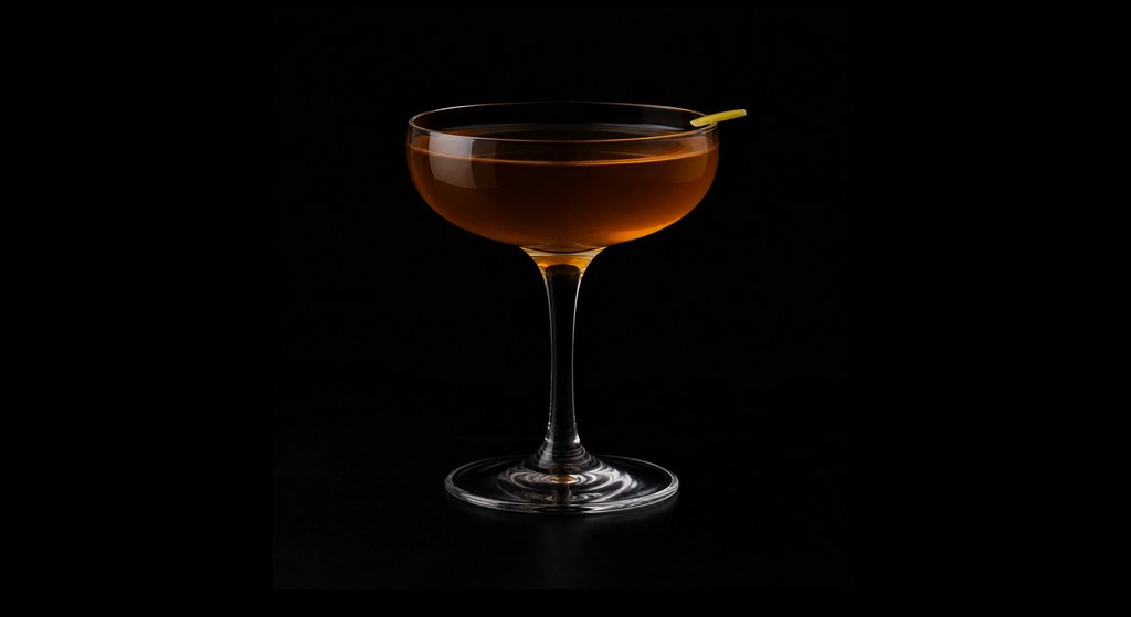 The Reanimator cocktail on a dark studio background