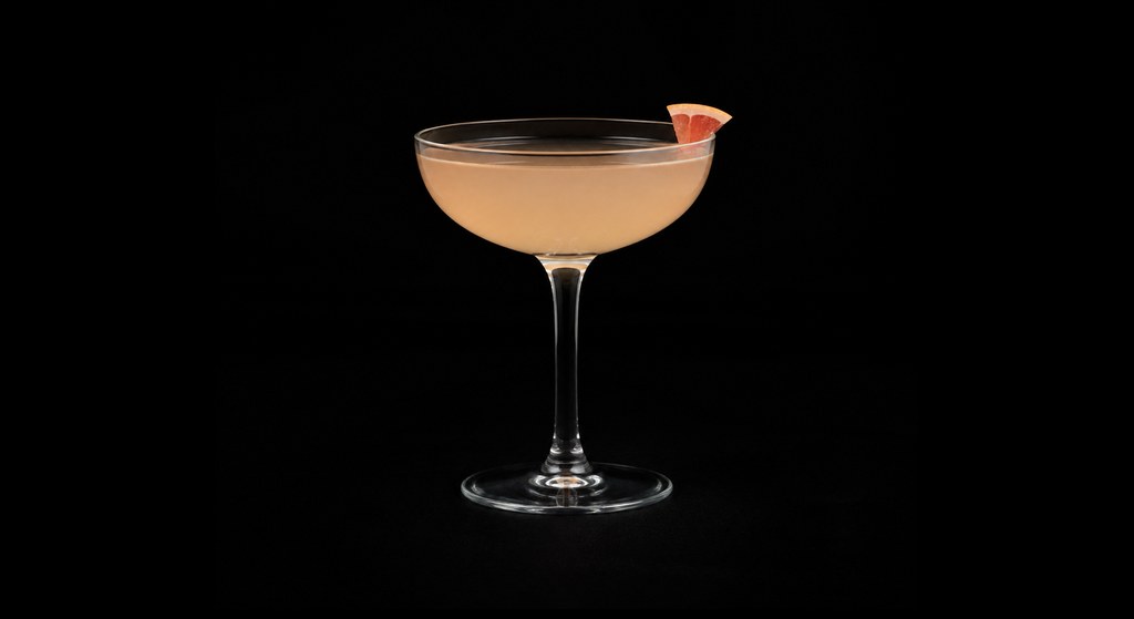 The Saint cocktail on a dark studio background