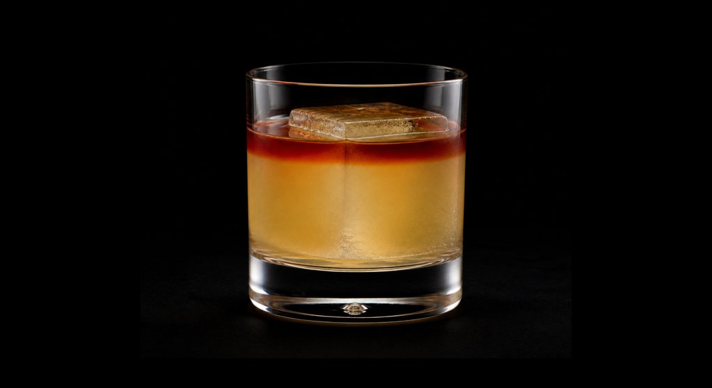Theobroma cocktail on a dark studio background