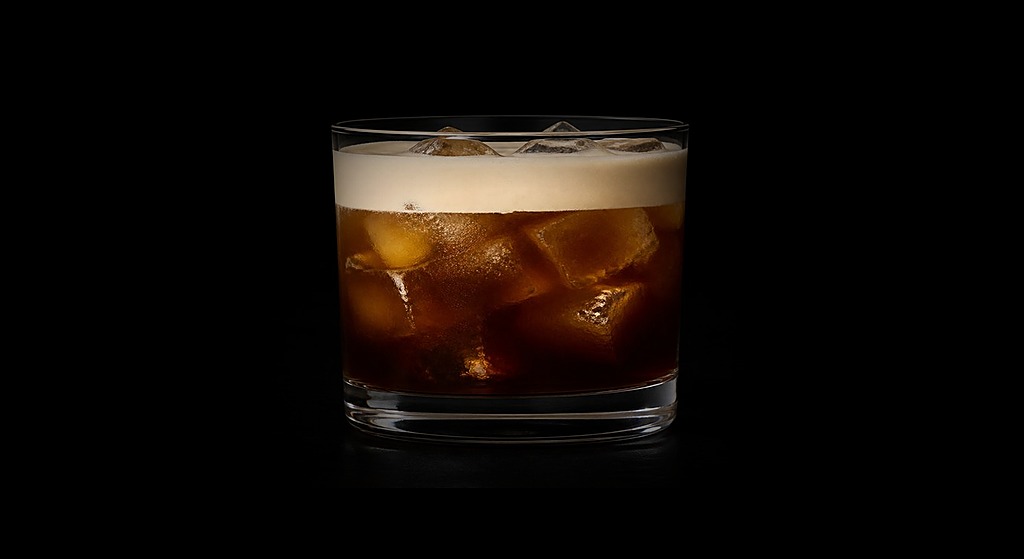Tipsy Jitters cocktail on a dark studio background