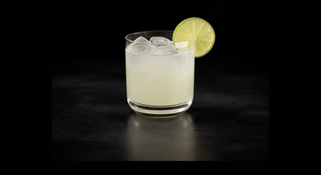 Tommy's Margarita cocktail on a dark studio background