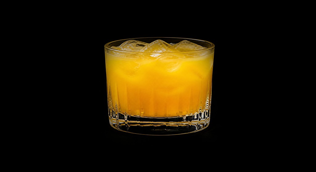 Top Banana cocktail on a dark studio background