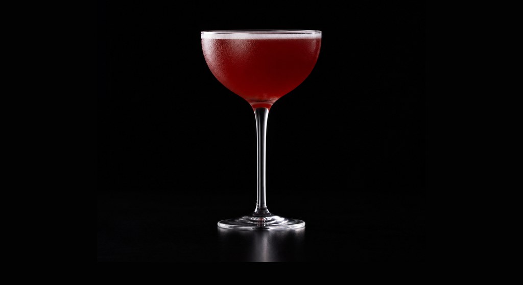 Trinidad Sour cocktail on a dark studio background