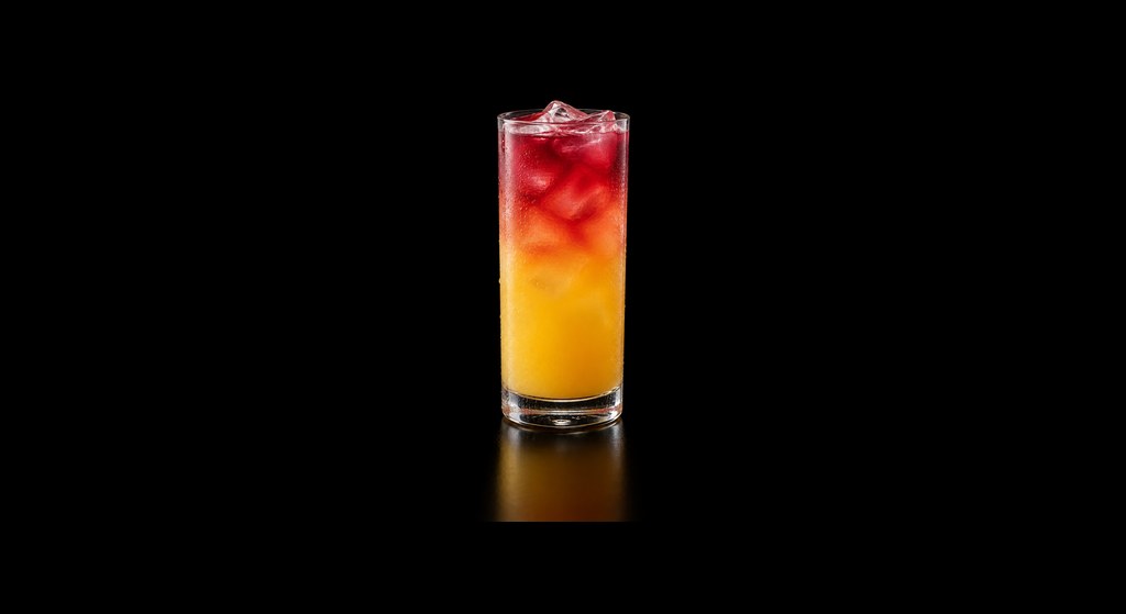 Tropical Mocktail cocktail on a dark studio background