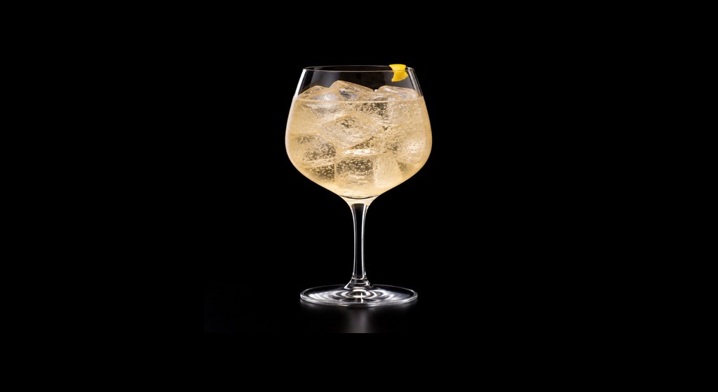 Umeshu Spritz cocktail on a dark studio background
