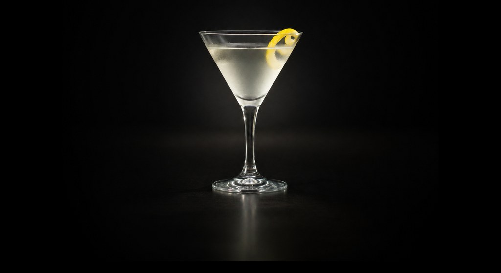 Vesper cocktail on a dark studio background