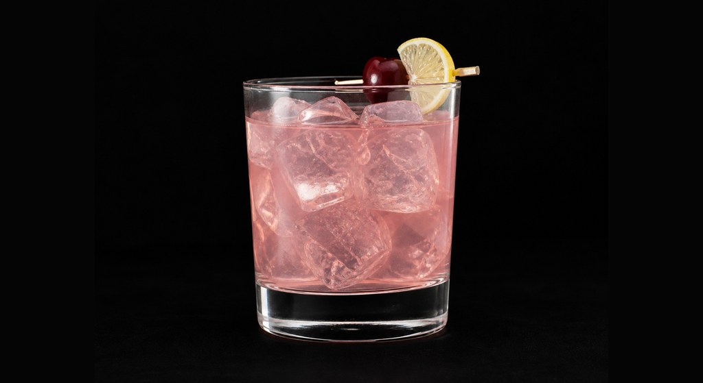 Vodka Daisy cocktail on a dark studio background