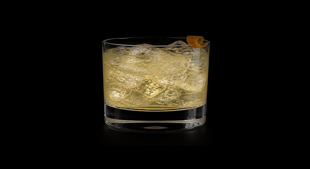 Vodka Sling cocktail on a dark studio background