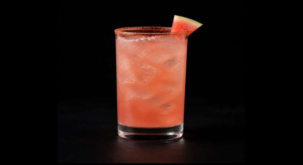 Watermelon Tequila Cooler cocktail on a dark studio background