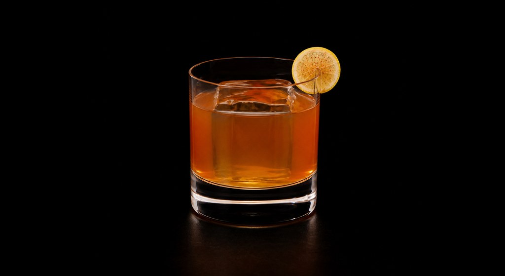 Whisky Business cocktail on a dark studio background