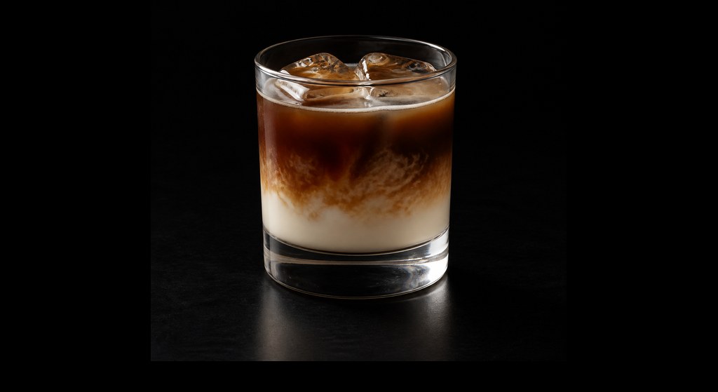 White Russian From Gus' Sip and Dip cocktail on a dark studio background