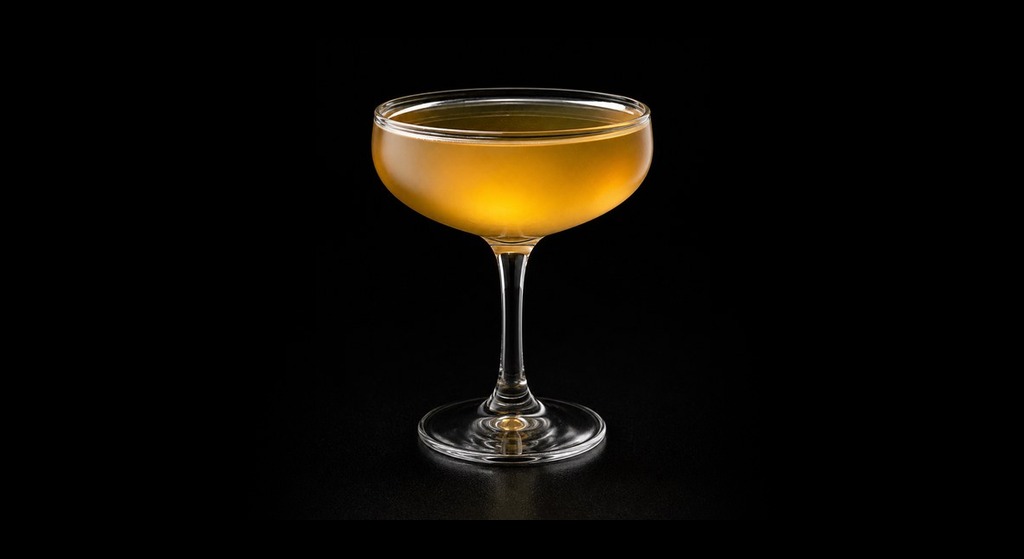 Will Rogers cocktail on a dark studio background