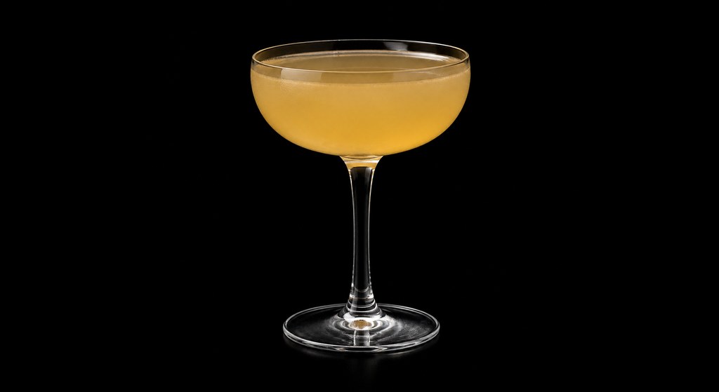 Woodstock cocktail on a dark studio background