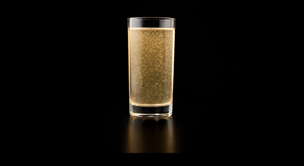 Zinger cocktail on a dark studio background