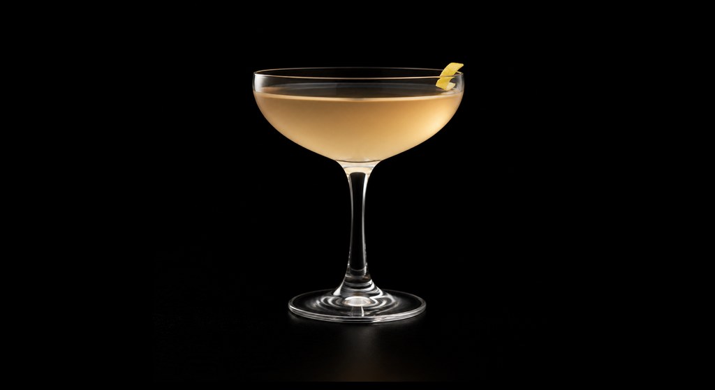 Zuzu's Petals cocktail on a dark studio background